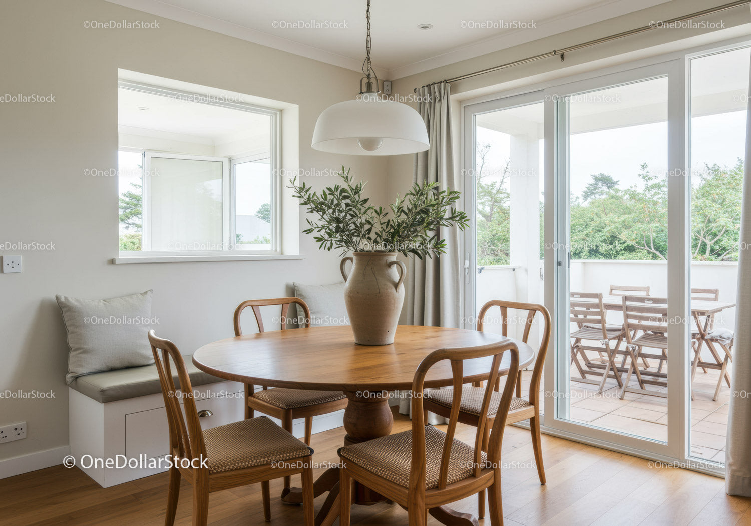 Cozy dining area with wooden table and natural light