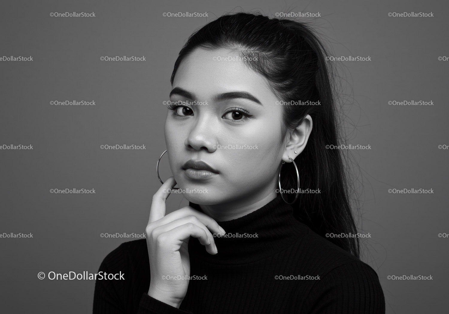 Black and White Portrait of a Confident Woman with Elegant Style
