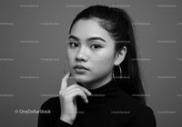 Black and White Portrait of a Confident Woman with Elegant Style