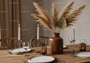 Elegant Dining Room with Pampas Grass and Candlelit Ambiance