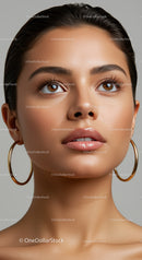 Close-Up Portrait of a Woman with Brown Eyes and Glossy Lips