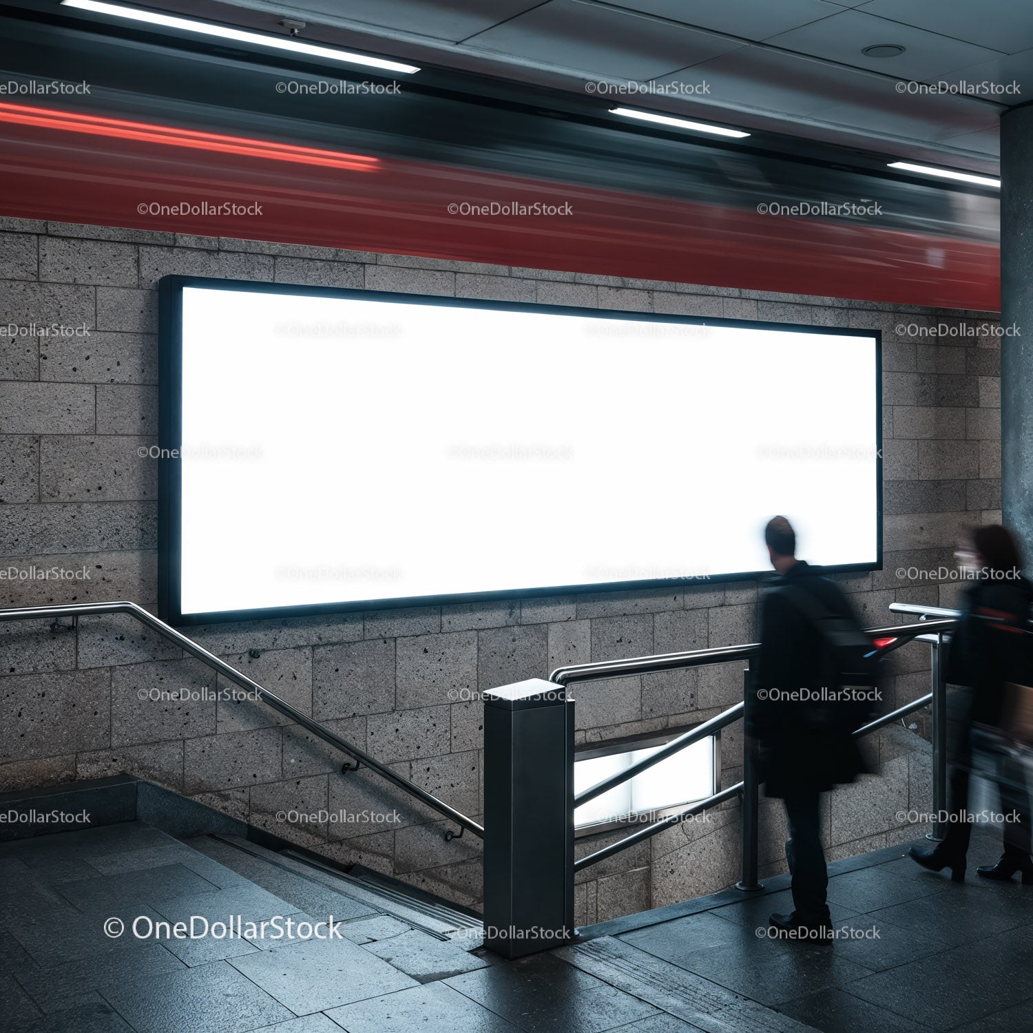 Commuters passing a large illuminated billboard in subway