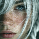 Close-Up of a Woman's Face with Blue Eye and Freckles in Natural Light