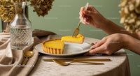 Elegant Lemon Tart with Gold Cutlery on Stylish Table