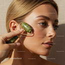 Woman Using Jade Roller for Facial Massage and Skin Rejuvenation
