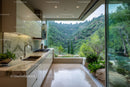 Modern Kitchen with Scenic Mountain View and Greenery