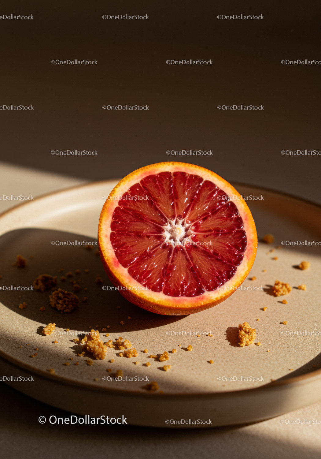 Close Up of Blood Orange Half on Ceramic Plate
