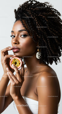 Elegant Woman with Curly Hair Holding Passion Fruit for Summer Beauty