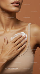 Close-Up of Woman Applying Moisturizer for Skincare Routine