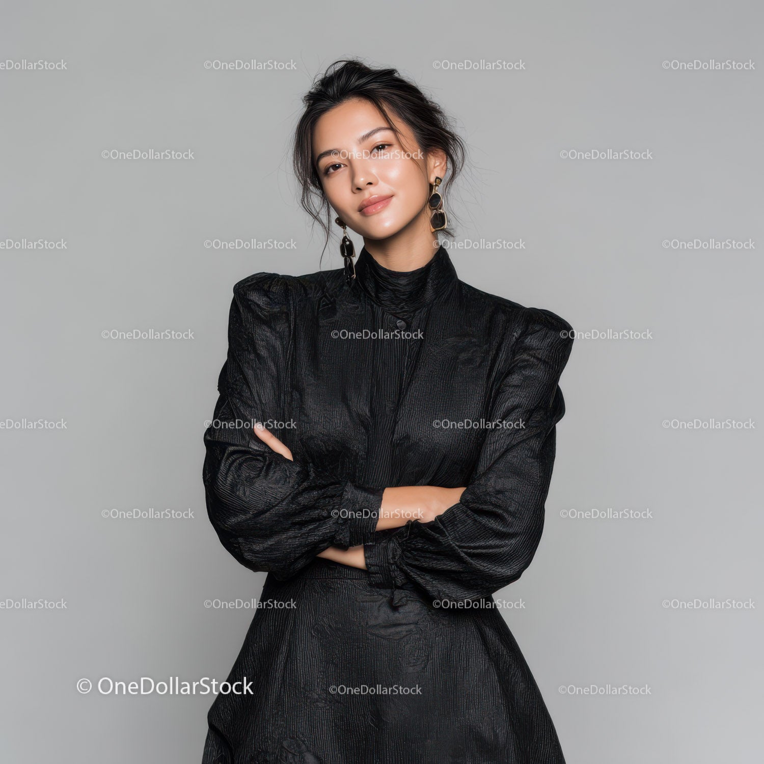 Elegant Woman in Black Dress with Jewelry in Studio