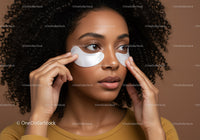 Young woman applying eye patches for skincare and beauty routine