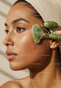 Close-up of a Woman Receiving Facial Massage with Jade Roller for Skin Glow