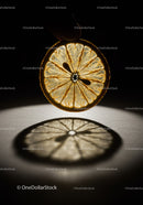 Backlit slice of lemon showing intricate details and shadow