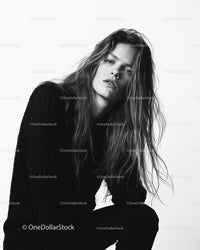Black and White Portrait of a Stylish Woman with Wavy Hair