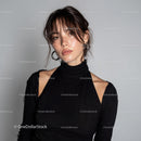 Stylish Young Woman in Black Top with Short Hair and Hoop Earrings