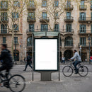 Blank Advertisement Board on Busy City Street in Spring