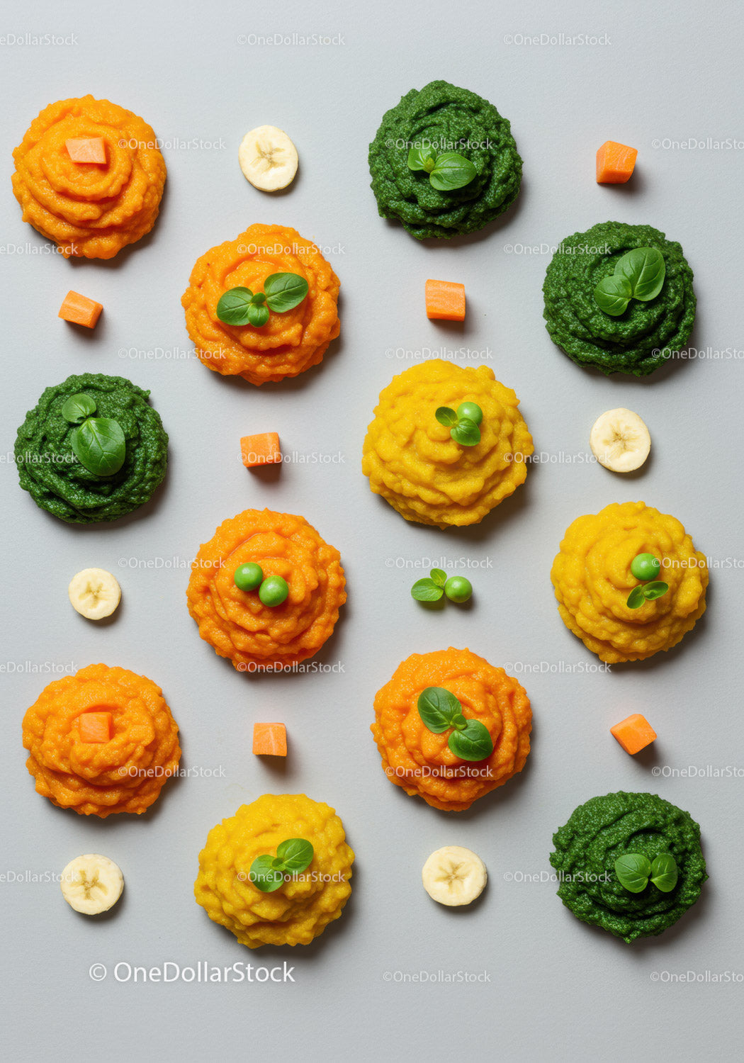 Colorful vegetable and fruit purees arranged in neat pattern