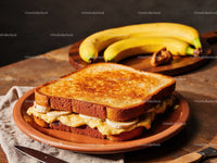 Banana and Peanut Butter Toast Sandwich on Rustic Plate