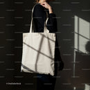 Woman Carrying Plain Canvas Tote Bag in Soft Light