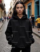 Fashionable Woman Wearing Black Hoodie in Urban City Street