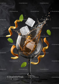 Whiskey Splash with Ice Cubes and Citrus Peel