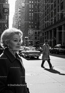 Urban City Street Scene with Older Woman and Vintage Car in Black and White