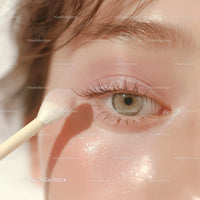 Close-up of Woman's Eye with Natural Makeup and Soft Pink Shades
