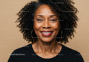 Elegant Black Woman with Curly Hair and Bright Smile Portrait