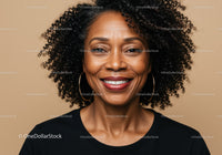 Elegant Black Woman with Curly Hair and Bright Smile Portrait