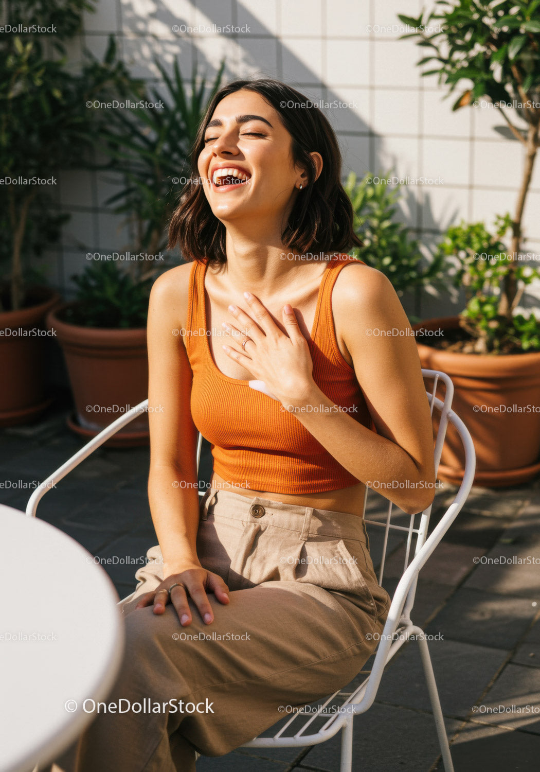 Young Woman Laughing Outdoors in Casual Summer Outfit