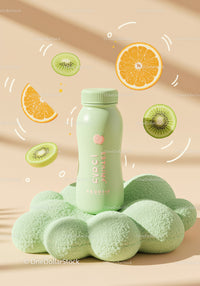 Fresh Green Juice Bottle Surrounded by Citrus and Kiwi Slices