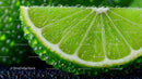 Fresh Lime Slice with Dew Drops Against a Green Background