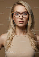 Elegant Blonde Woman Wearing Glasses in Professional Studio Portrait