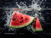 Fresh Watermelon Slices Splashing into Water on Dark Background