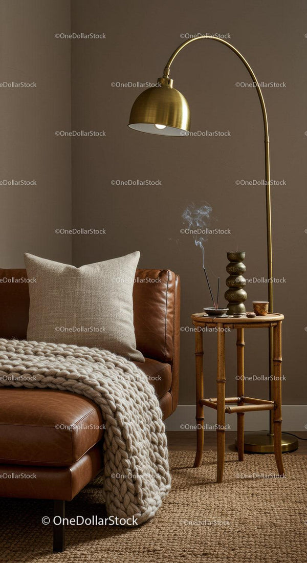 Cozy living room corner with leather sofa and warm lighting