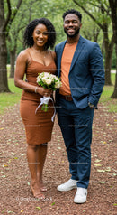 Smiling Couple Posing Outdoors with Bouquet