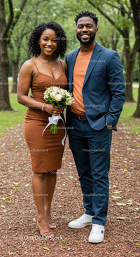 Smiling Couple Posing Outdoors with Bouquet