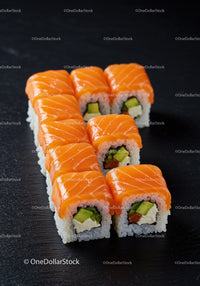 Fresh salmon sushi rolls with avocado and cream cheese