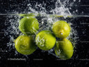 Fresh Green Limes Splashing Water in a Dynamic Fruit Scene