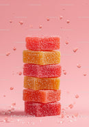 Stack of Sugary Fruit Jelly Candies on Pink Background