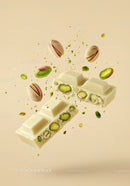 White chocolate bar with whole pistachio nuts floating