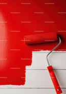 Red Paint Wall in Progress with Paint Roller on White Wooden Floor