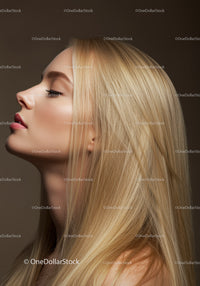 Blonde woman with flawless skin in profile pose