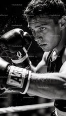 Focused Boxer Training in Intense Black and White Scene
