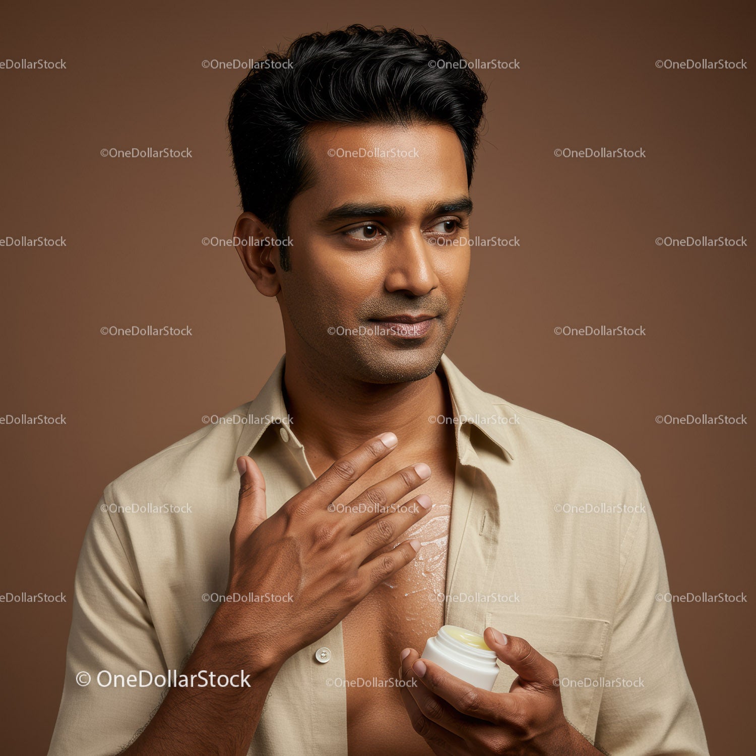 Young Man Applying Lotion for Skincare Routine Men Grooming Concept