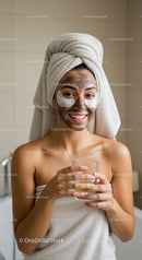 Young Woman Enjoying Spa and Facial Mask Therapy