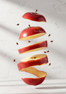 Floating Red Apple Slices with Seeds and Peel