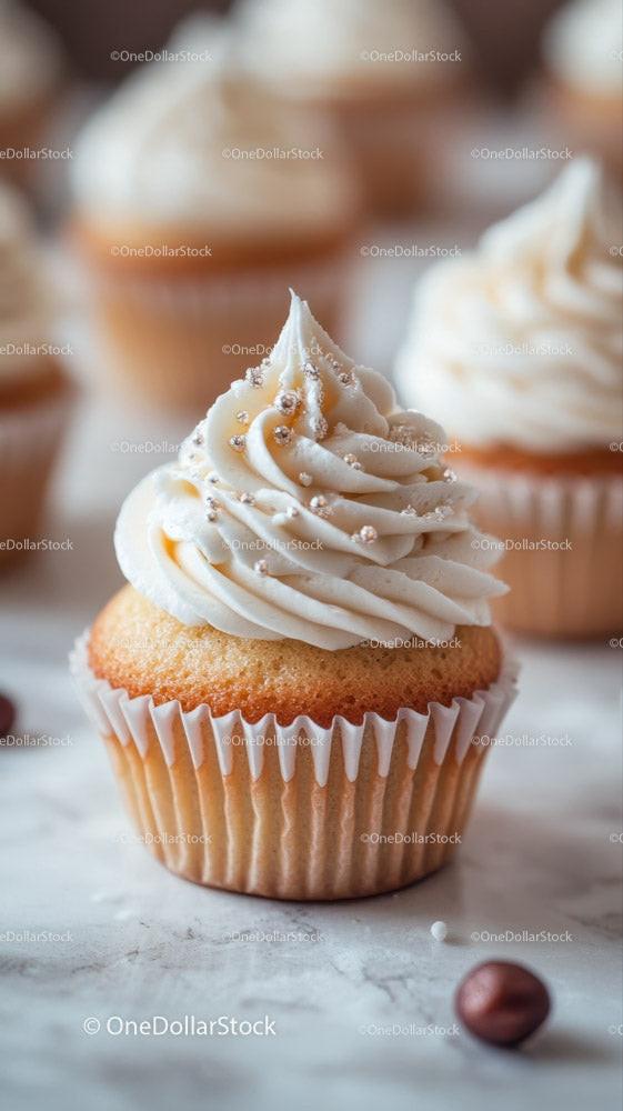 Delicious Vanilla Cupcake with Whipped Frosting and Silver Beads