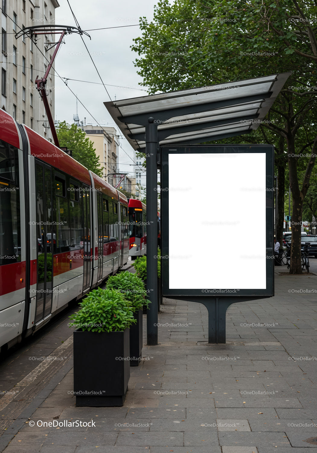 Modern tram station with blank advertising display