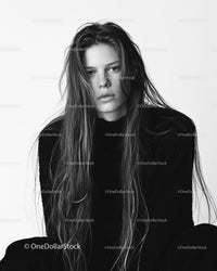 Portrait of a Young Woman with Long Hair in Monochrome Style